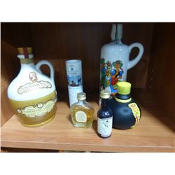 5 LIQUOR DECANTERS INCLUDING YORKSHIRE, OUZO, ETC
