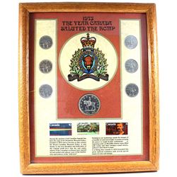 *1973 'The Year Canada Saluted the RCMP' 7-coin Set with 3x RCMP Stamps in Wooden Frame. The coins i