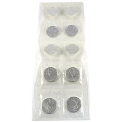 2003 Canada 1oz .9999 Fine Silver Maple Leafs in Sealed Mint Plastic Sheet (some coins are toned). 1