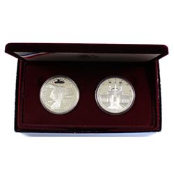 1984 & 1984 United States Olympic 2-coin Silver Proof Set (coins lightly toned & capsules lightly sc