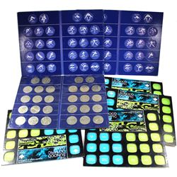 *500+ Olympic Tokens with 7 Cardboard holder.