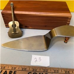 DESSERT LIFTER (HIGH HEEL COMES OFF, IT IS MAGNETIC) AND GUITAR BELT BUCKLE