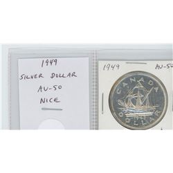 1949 SILVER DOLLAR. AU-50. NICE. COMMEMORATES NEWFOUNDLAND JOINING CANADA AND DEPICTS JOHN CABOT’S S