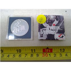 1997 SPECIMEN SILVER DOLLAR THAT COMMEMORATES THE 1972 CANADA-RUSSIA HOCKEY SERIES. IN CASE OF ISSUE