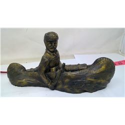 EXPLORER IN CANOE SCULPTURE