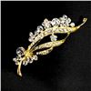 Image 1 : Contemporary designer brooch with rhinestones.