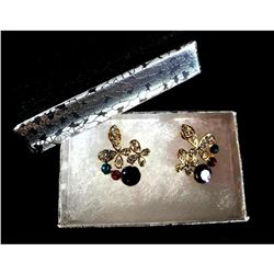 Designer cross earrings with colorful rhinestones.