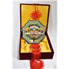 Image 1 : Koji Pottery dragon's head motif wall hanging 9" in diameter, with red tassels in fitted presentatio