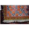 Image 2 : 100% handmade Iranian carpet with overall multi coloured daisy pattern and fringed edge in shades of