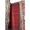 Image 1 : Small 100% wool scatter rug with red background, cream, copper black highlights etc. 22" X 51"