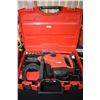 Image 1 : Lightly used Hilti TE60 hammer drill with two new concrete bits and a used jack hammer bit, working 