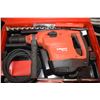 Image 2 : Lightly used Hilti TE60 hammer drill with two new concrete bits and a used jack hammer bit, working 