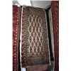 Image 1 : 100% handmade scatter rug with tan background and highlights of green, blue, burgundy etc. 16" X 34"