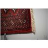 Image 2 : Small 100% wool scatter rug with red background, highlights of cream, copper and black 18" X 38"