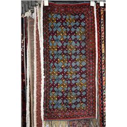 100% handmade scatter rug in tones of red, blues, copper etc. 17  X 36 