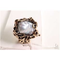 14kt yellow gold ring set with large bluish silver baroque-irregular saltwater cultured pearl 8.75 X