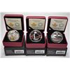 Image 1 : Three boxed Royal Canadian Mint collector coins including 2107 $20 fine silver "Canadian Honours Sac