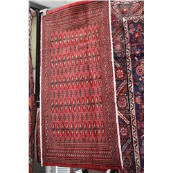 Small 100% handmade scatter rug with red background and highlights of copper, black and cream, 50" X