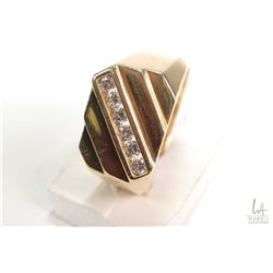 14kt yellow gold and channel set diamond ring. Set with .33cts of round full cut white diamonds. Ret