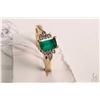 Image 1 : 10kt yellow gold emerald and diamond ring set with lab created emerald cut emerald gemstone and eigh