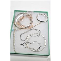 Selection of sterling silver jewellery including two pairs of earrings, two hinged bracelets, pearl 