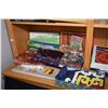 Image 2 : Shelf lot of fabric items including silk scarves, table clothes, wall hanging etc.