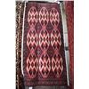 Image 1 : Small 100% wool scatter rug in tones of red, black, blue etc. 24" X 51"