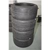 Image 1 : Set of four used Goodyear tires including two 285 and two 305, both 35ZR20, note these tires have ap