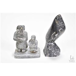 Two soapstone carvings including a 6" seal with etched "1353" on underside and an Inuit mother and c