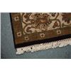 Image 2 : Wool area carpet with deep chocolate brown background, overall floral and multi borders with highlig