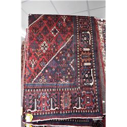 100% handmade Iranian Joshegan carpet with center medallion, red background, stylized florals and mu