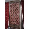 Image 1 : 100% handmade scatter rug with geometric design in tones of red, taupe, copper etc. 22" X 52"