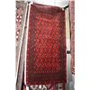 Image 1 : 100% handmade scatter rug with red background and highlights of copper, black etc. 25" X 51"