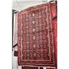 Image 1 : 100% handmade scatter rug with red background and highlights of pink, blues etc. 27" X 43"