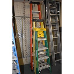 Sturdy 8' step ladder, a Werner 6' step ladder and a Featherlite 5' step ladder