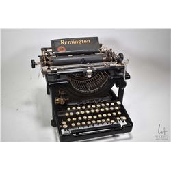 Vintage Remington typewriter, missing back feet