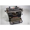 Image 1 : Vintage Remington typewriter, note missing one foot