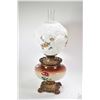 Image 1 : Large banquet style oil lamp with cast base and milk glass embossed shade with transferware flowers 