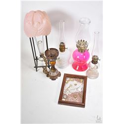 Ecletic lot of collectibles including small framed collage, vintage miniature lamps, strange hanging