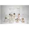 Image 1 : Seven colourless glass oil lamps with hurricanes including finger lamps etc.