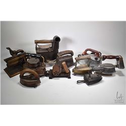 Selection of vintage collectibles irons including cast, electric, gas etc. plus a hand fabric fluter