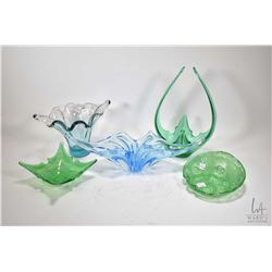 Five pieces of art glass including 12" green bubble glass basket, a 16" wide blue glass dish etc.