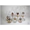 Image 1 : Seven colourless oil lamps, various styles and sizes