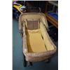 Image 2 : Antique wicker baby carriage on spring metal chasis with wooden spoked wheels