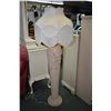 Image 1 : Semi contemporary floral motif floor lamp with illuminated base and fringed shade