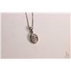 Image 1 : Ladies 14kt white gold 18" in length with a 14kt white gold and diamond pendant