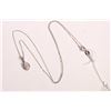 Image 2 : Ladies 14kt white gold 18" in length with a 14kt white gold and diamond pendant