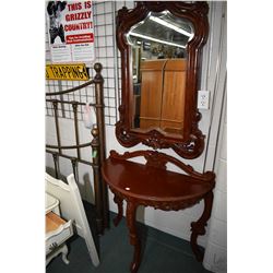 Antique style flat-to-the wall console table and a wood framed bevelled wall mirror