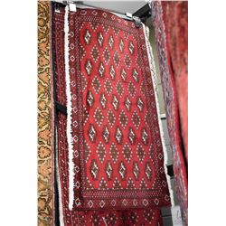 100% handmade Iranian wool runner carpet with fringed edges, geometric design in shades of deep red,