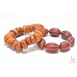 Two bracelets including bees wax and an agate bracelet